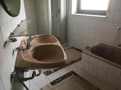 Ein Badezimmer in der Unterkunft Pension Heller