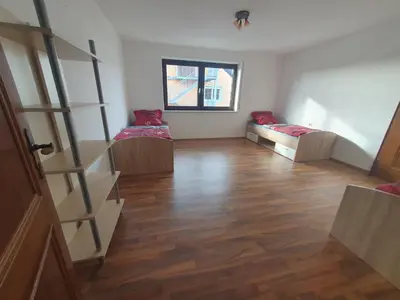 Ein Bett oder Betten in einem Zimmer der Unterkunft Pension Heller