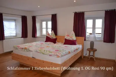Ein Bett oder Betten in einem Zimmer der Unterkunft Ferienwohnung Fenzl