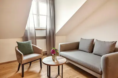 Ein Sitzbereich in der Unterkunft Hotel Gsteig