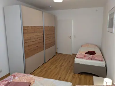 Ein Bett oder Betten in einem Zimmer der Unterkunft Ferienwohnung MonSevi
