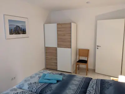 Ein Bett oder Betten in einem Zimmer der Unterkunft Ferienwohnung MonSevi
