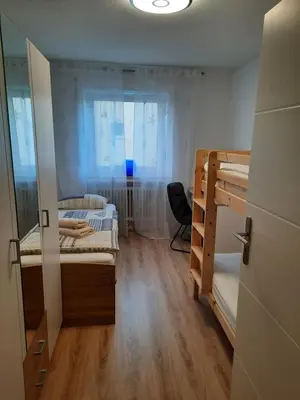 Ein Bett oder Betten in einem Zimmer der Unterkunft Moderne 3Zimmer Wohnung, in Königsbrunn bei Augsburg