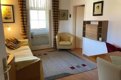 Ein Sitzbereich in der Unterkunft Top-Appartement direkt an der Kampenwandbahn
