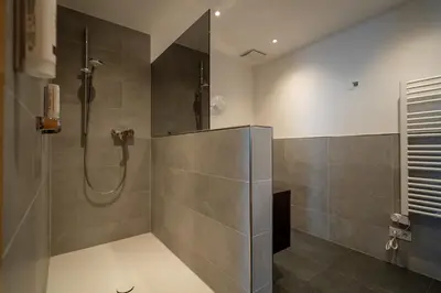 Ein Badezimmer in der Unterkunft Hotel Vollmann