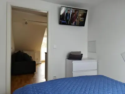 Ein Bett oder Betten in einem Zimmer der Unterkunft Rooftop Solln - 20min Oktoberfest/Zentrum