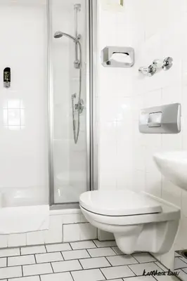 Ein Badezimmer in der Unterkunft Hotel Blutenburg
