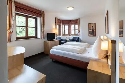 Ein Bett oder Betten in einem Zimmer der Unterkunft Alter Hof