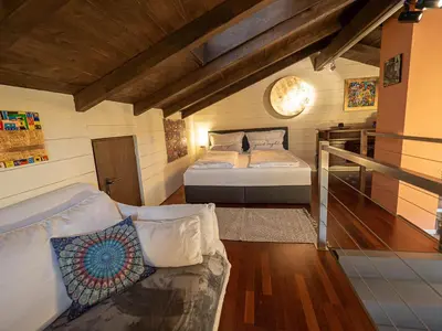 Ein Bett oder Betten in einem Zimmer der Unterkunft Kunst im Loft