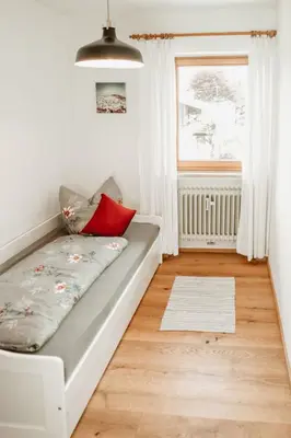 Ein Bett oder Betten in einem Zimmer der Unterkunft Ferienwohnung Christine Fischer