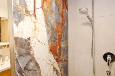 Ein Badezimmer in der Unterkunft Hotel Sixt