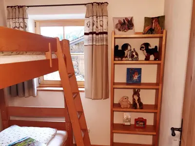 Ein Bett oder Betten in einem Zimmer der Unterkunft Brüglhuberhof