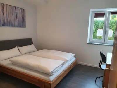 Ein Bett oder Betten in einem Zimmer der Unterkunft Pension HopfaHeisl