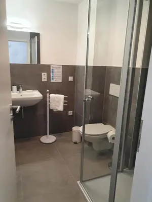 Ein Badezimmer in der Unterkunft Pension HopfaHeisl