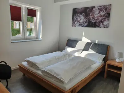 Ein Bett oder Betten in einem Zimmer der Unterkunft Pension HopfaHeisl