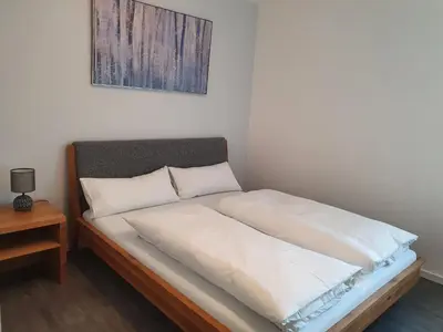 Ein Bett oder Betten in einem Zimmer der Unterkunft Pension HopfaHeisl