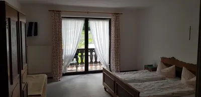 Ein Bett oder Betten in einem Zimmer der Unterkunft Feichten-Hof Zaiser Zimmer