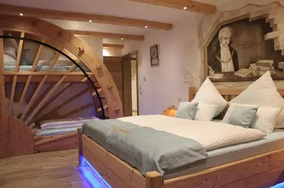 Ein Bett oder Betten in einem Zimmer der Unterkunft Vils-Residenz