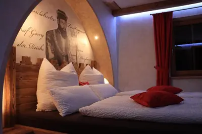 Ein Bett oder Betten in einem Zimmer der Unterkunft Vils-Residenz