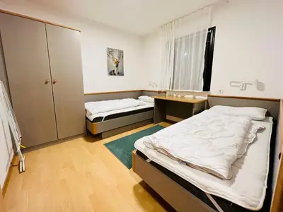 Ein Bett oder Betten in einem Zimmer der Unterkunft Haus Lechbruck