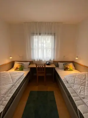 Ein Bett oder Betten in einem Zimmer der Unterkunft Haus Lechbruck