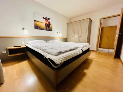 Ein Bett oder Betten in einem Zimmer der Unterkunft Haus Lechbruck