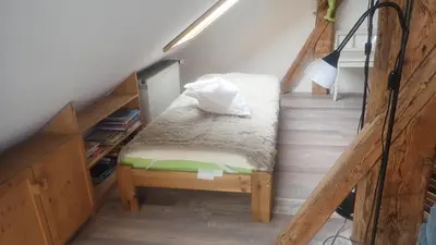 Ein Bett oder Betten in einem Zimmer der Unterkunft Im Juchhe