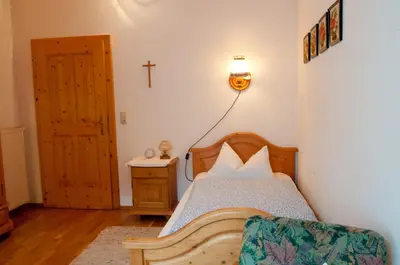 Ein Bett oder Betten in einem Zimmer der Unterkunft Hoderhof