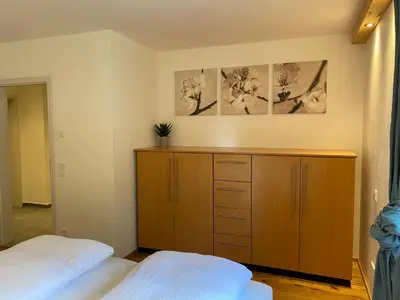 Ein Bett oder Betten in einem Zimmer der Unterkunft Neurenovierte Ferienwohnung Franzl