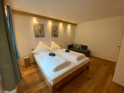 Ein Bett oder Betten in einem Zimmer der Unterkunft Neurenovierte Ferienwohnung Franzl