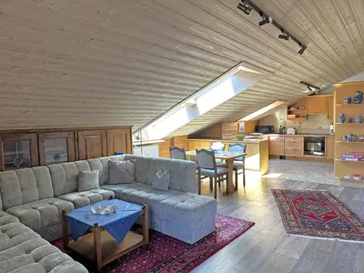 Ein Sitzbereich in der Unterkunft Ferienwohnung Haus Kampenwand Löhr