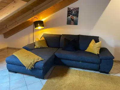 Ein Sitzbereich in der Unterkunft Ferienwohnung Hubertus