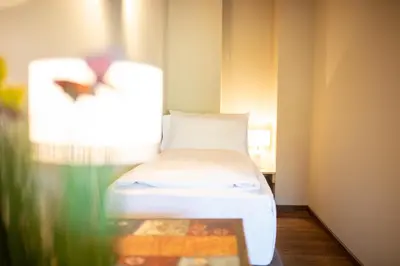 Ein Bett oder Betten in einem Zimmer der Unterkunft Haus Ludwig Alpenkrähe