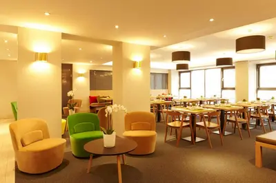 Ein Sitzbereich in der Unterkunft Hotel Stachus