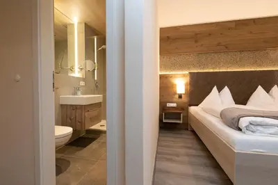 Ein Badezimmer in der Unterkunft Hotel am Wald