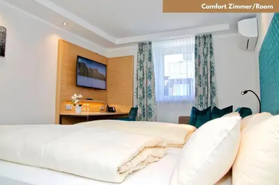Ein Bett oder Betten in einem Zimmer der Unterkunft Hotel Zur Post