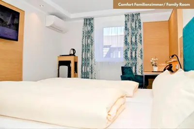 Ein Bett oder Betten in einem Zimmer der Unterkunft Hotel Zur Post