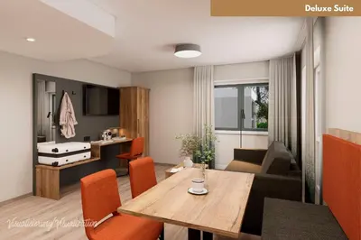Ein Sitzbereich in der Unterkunft Hotel Zur Post