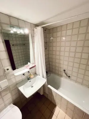 Ein Badezimmer in der Unterkunft Hotelturm Wohnung