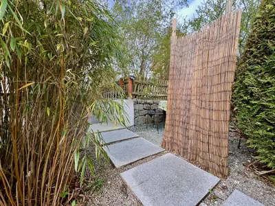 Ein Garten an der Unterkunft Beim Thöny - schönes Apartment mit privatem Zugang