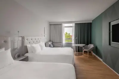 Ein Bett oder Betten in einem Zimmer der Unterkunft Munich Marriott Hotel