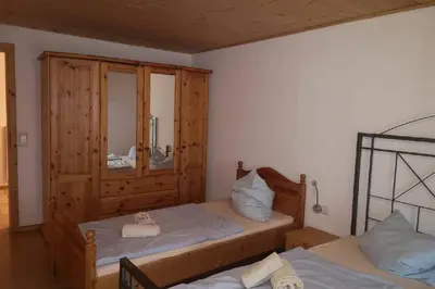Ein Bett oder Betten in einem Zimmer der Unterkunft Andermichlhof (3)Ferienwohnung Groß Landsberger Strasse 8