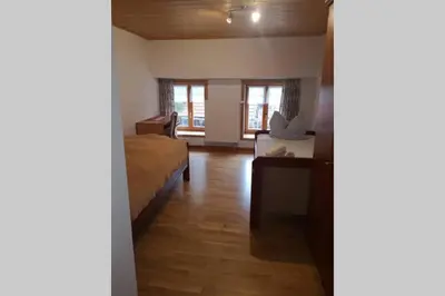 Ein Bett oder Betten in einem Zimmer der Unterkunft Andermichlhof (3)Ferienwohnung Groß Landsberger Strasse 8
