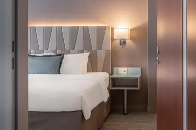 Ein Bett oder Betten in einem Zimmer der Unterkunft Courtyard by Marriott Munich City Center