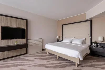 Ein Bett oder Betten in einem Zimmer der Unterkunft Munich Airport Marriott Hotel