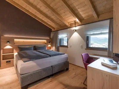 Ein Bett oder Betten in einem Zimmer der Unterkunft Refugium am Wilden Kaiser