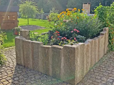 Ein Garten an der Unterkunft Ferienwohnungen Kieferbachtal