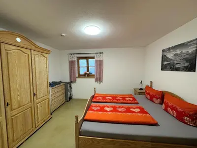Ein Bett oder Betten in einem Zimmer der Unterkunft Ferienwohnungen Kieferbachtal
