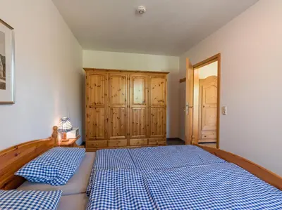 Ein Bett oder Betten in einem Zimmer der Unterkunft Ferienwohnung Bergblick