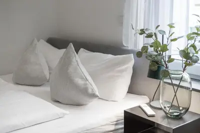 Ein Bett oder Betten in einem Zimmer der Unterkunft ma suite - Augsburg City